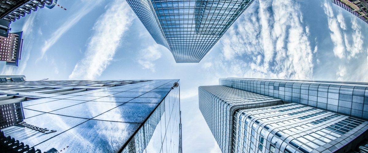 pexels-photo-830891-830891 Low angle shot of modern skyscrapers in Frankfurt, showing reflections and sky.
